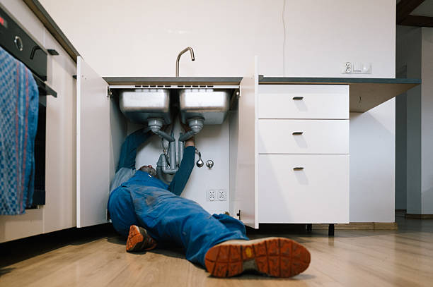 Professional Drain Cleaning technician working in Lincoln Park, CO